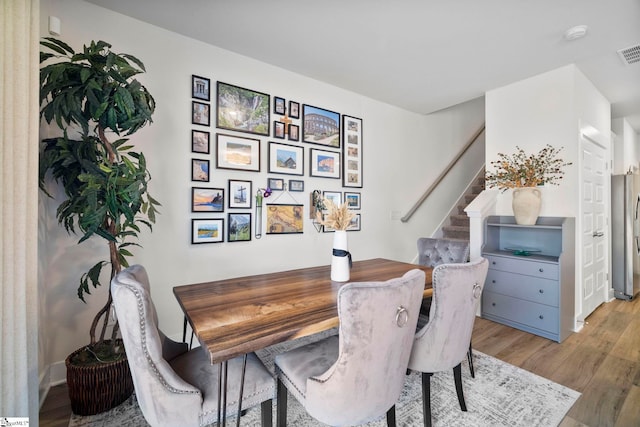 dining area featuring light hardwood / wood-style flooring