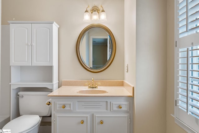 bathroom with vanity and toilet