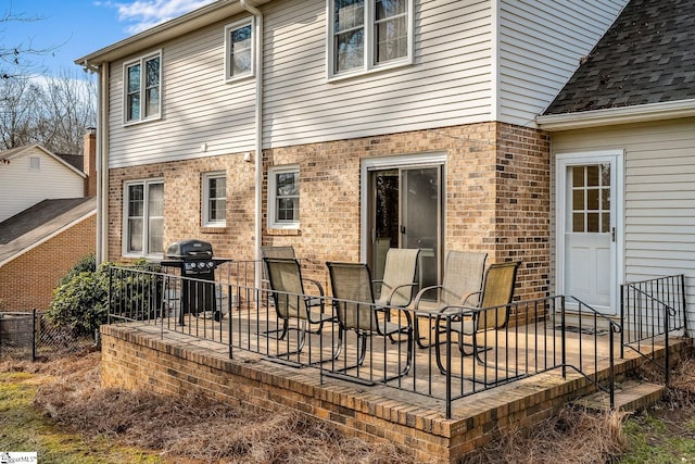 rear view of property with a patio area