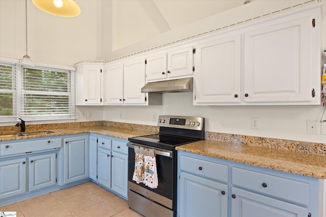 kitchen featuring sink, stainless steel range with electric cooktop, white cabinets, and blue cabinets