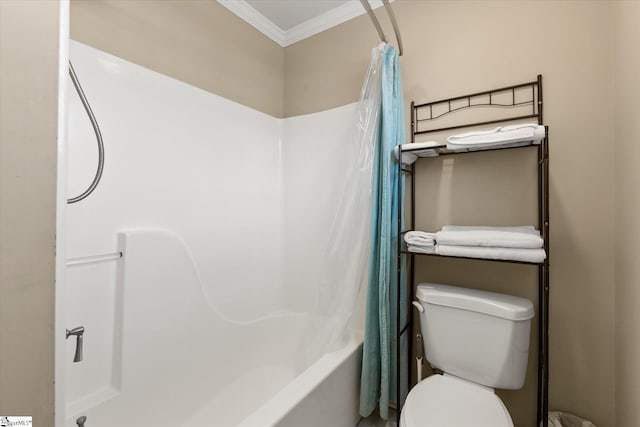 bathroom featuring ornamental molding, shower / bathtub combination with curtain, and toilet