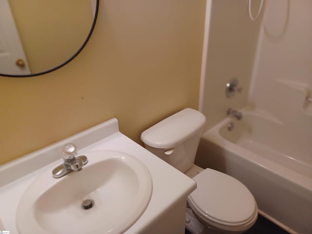 full bathroom with toilet, shower / bath combination, and sink