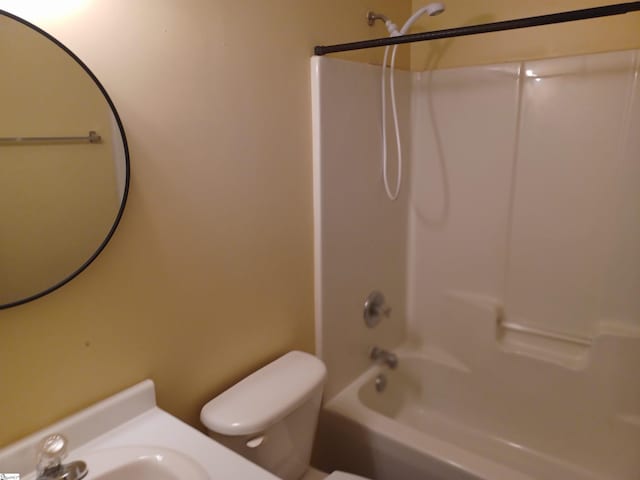 full bathroom featuring bathtub / shower combination, sink, and toilet