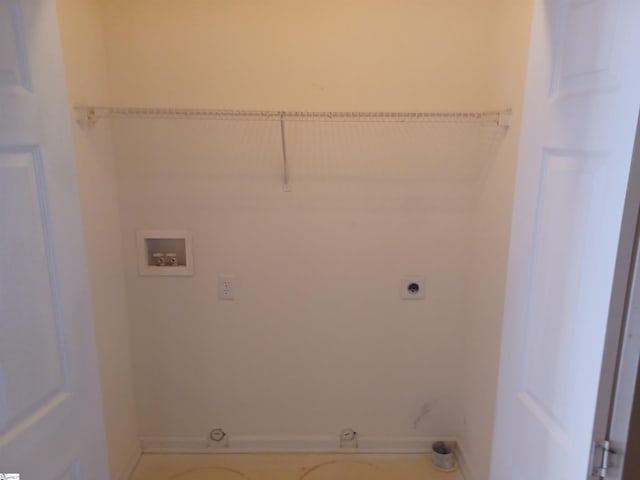 washroom with hookup for a washing machine and hookup for an electric dryer