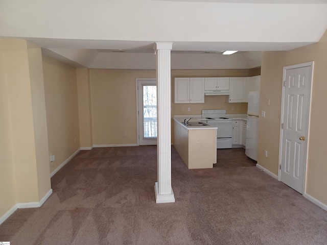 kitchen featuring dark carpet, sink, white cabinets, and white appliances