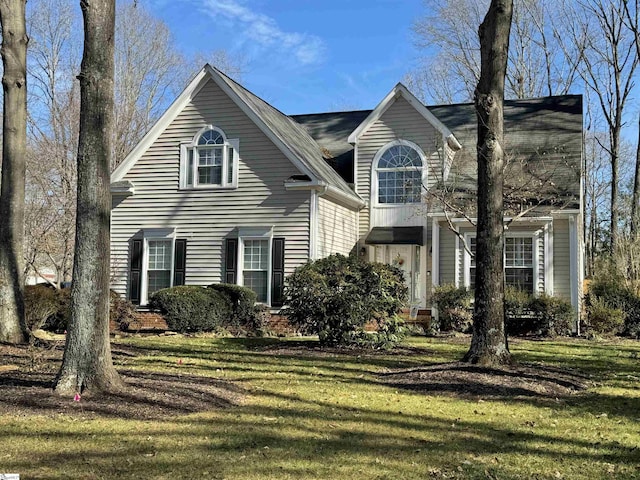 view of front of home with a front yard