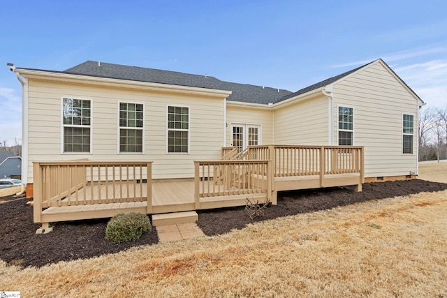 rear view of property with a deck