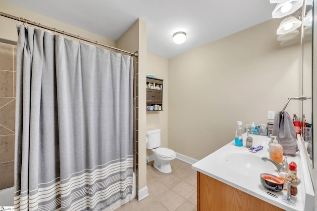 bathroom with vanity, walk in shower, and toilet