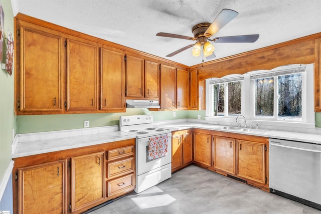 kitchen featuring sink, dishwasher, ceiling fan, electric range, and a textured ceiling