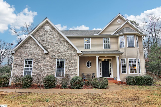 view of front of home with a front yard