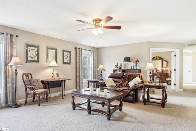 living room featuring ceiling fan and light colored carpet