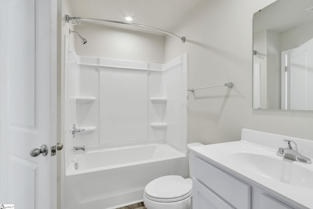 full bathroom featuring vanity, shower / bathing tub combination, and toilet