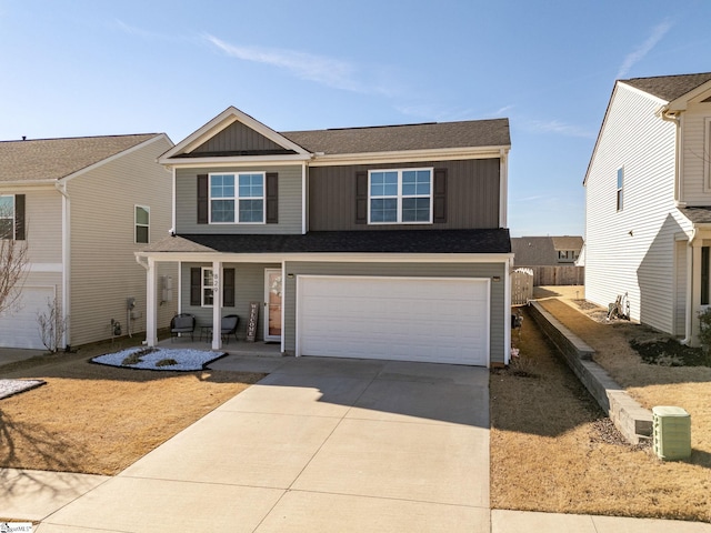 view of front of home featuring a garage and covered porch