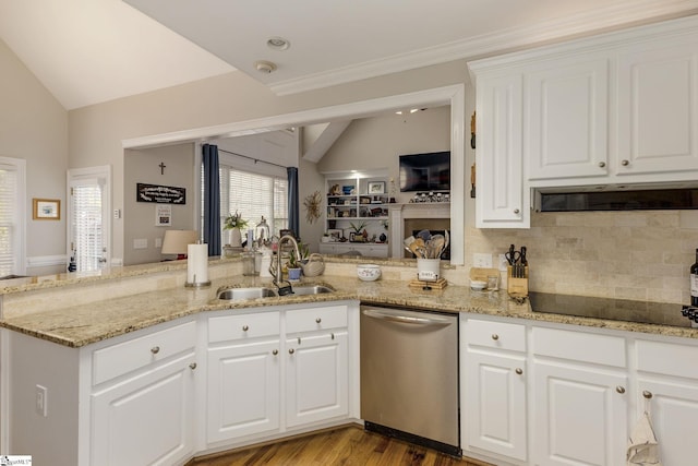 kitchen with lofted ceiling, dishwasher, sink, and white cabinets