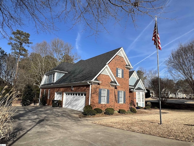 view of front of property with a garage