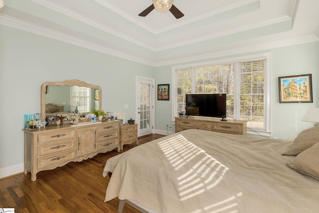 bedroom with crown molding, ceiling fan, dark hardwood / wood-style flooring, access to outside, and a raised ceiling