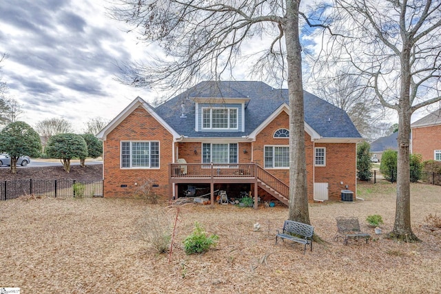 back of house with a wooden deck