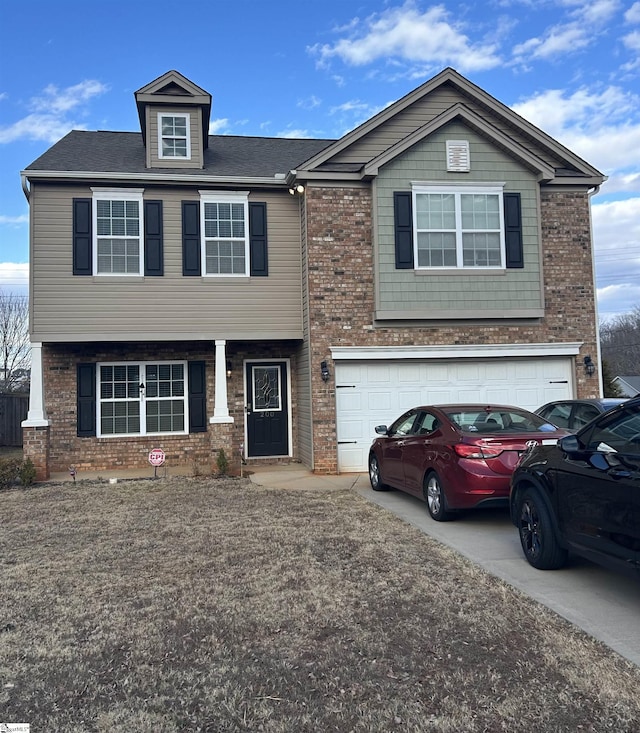 view of front of home with a garage