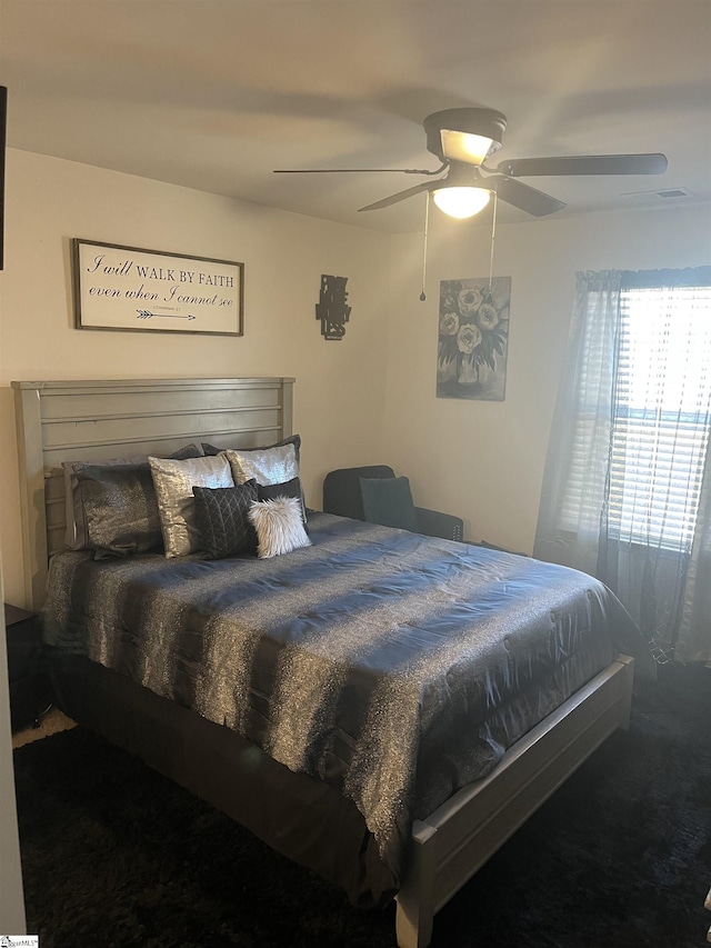 bedroom featuring carpet floors and ceiling fan