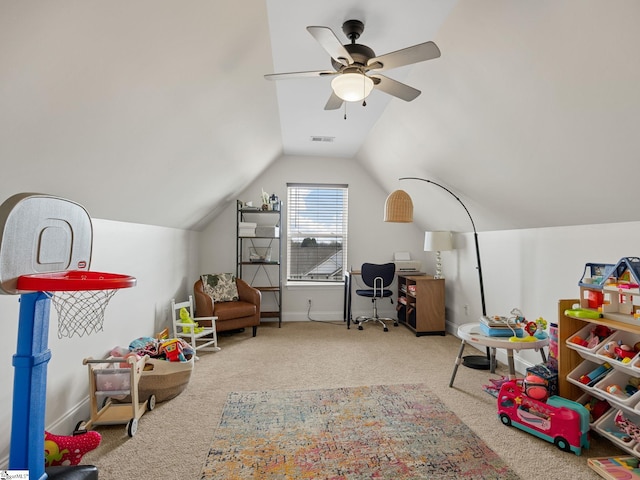 game room with vaulted ceiling, carpet flooring, and ceiling fan