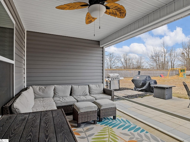 view of patio / terrace with a grill, outdoor lounge area, and a playground