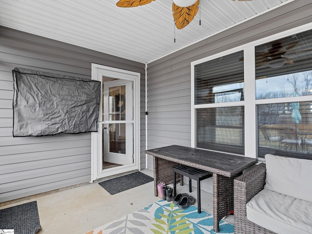 exterior space featuring ceiling fan