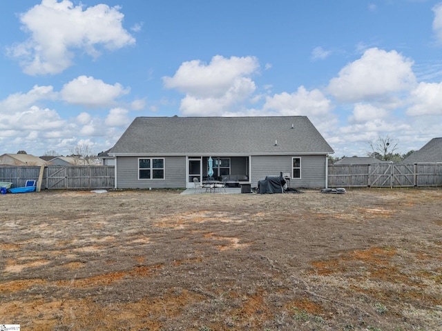 rear view of house featuring a patio