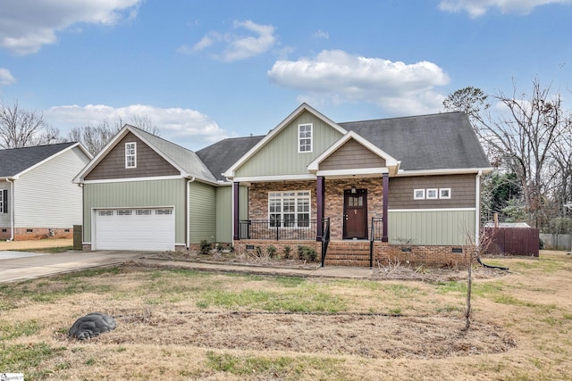 view of front of house with a garage and covered porch