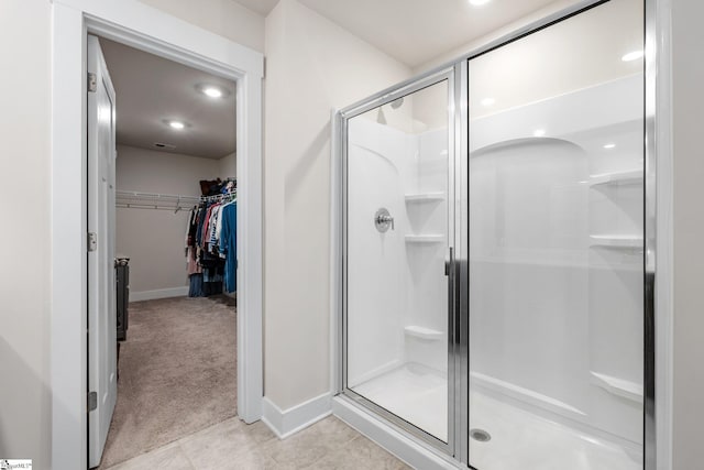 bathroom with an enclosed shower