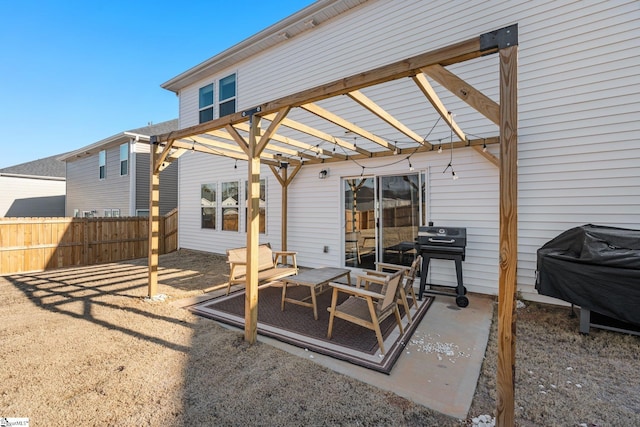 view of patio / terrace with area for grilling and a pergola