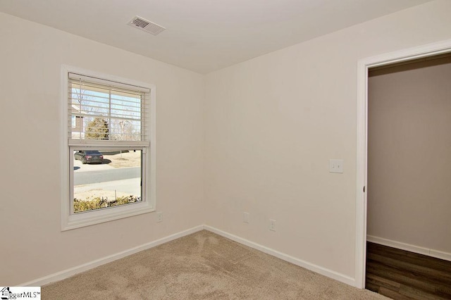 spare room with carpet flooring