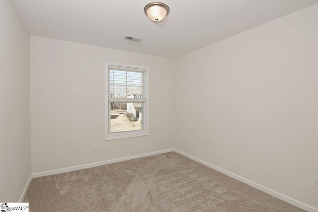 view of carpeted spare room