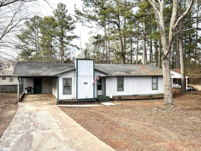 view of front of property with a carport