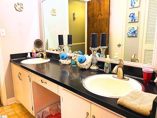 bathroom featuring vanity and tile patterned flooring