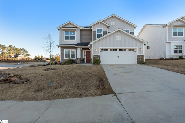 view of front of house featuring a garage and a front yard