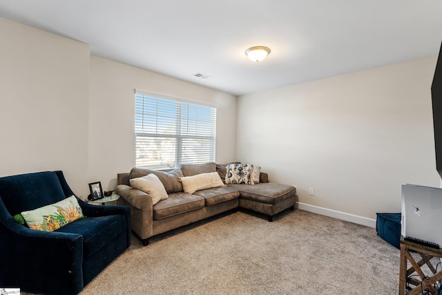 living room featuring light colored carpet