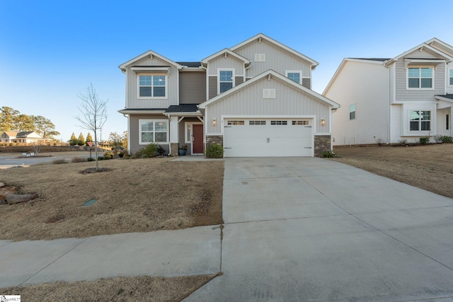 view of front facade with a garage and a front yard