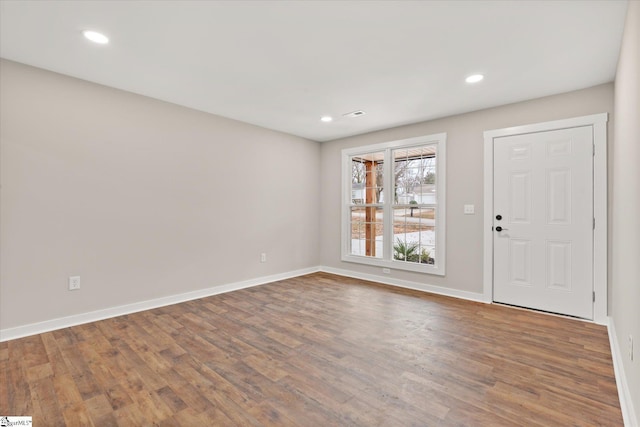 entrance foyer featuring hardwood / wood-style flooring