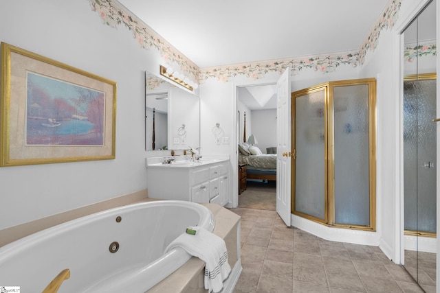 bathroom featuring vanity and plus walk in shower