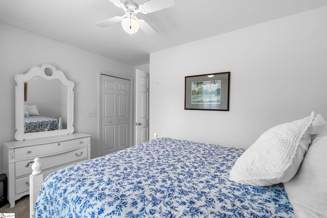 bedroom with carpet floors, a closet, and ceiling fan