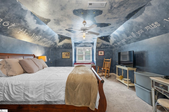 bedroom featuring ceiling fan, vaulted ceiling, and carpet