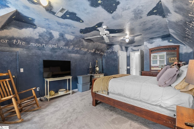 bedroom featuring ceiling fan, carpet flooring, and vaulted ceiling