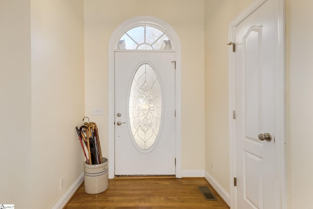 foyer with light hardwood / wood-style flooring