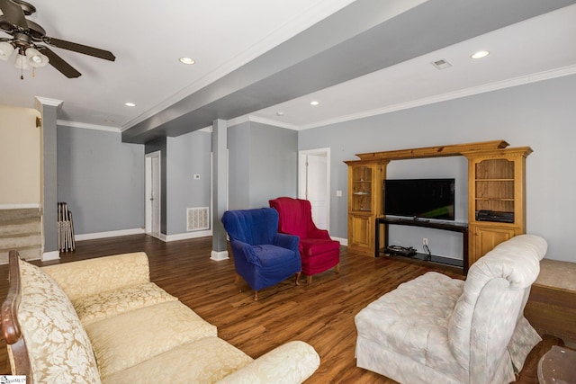 living room featuring ornamental molding, dark hardwood / wood-style floors, and ceiling fan