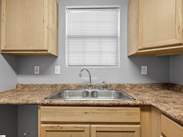 kitchen featuring sink and light brown cabinets