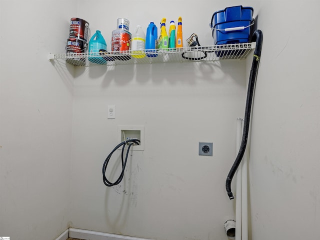 clothes washing area with washer hookup and hookup for an electric dryer