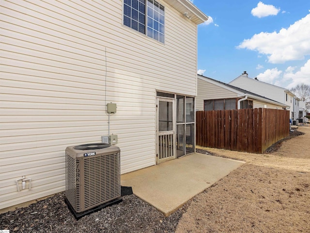 exterior space featuring cooling unit and a patio area