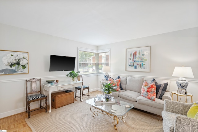 living room featuring light parquet floors