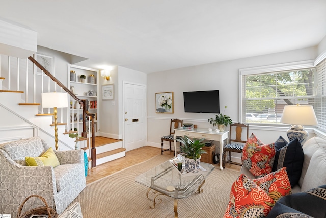 living room featuring light parquet floors