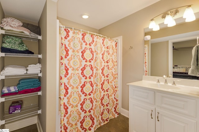 bathroom with vanity and walk in shower